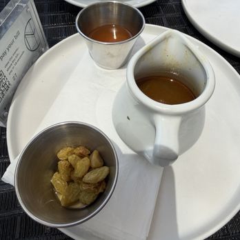 Massilia - Raisins and sauces to accompany the Moroccan Couscous Royale - French Near Me - Los Angeles, California Massilia - Raisins and sauces to accompany the Moroccan Couscous Royale - French Near Me - Los Angeles, California