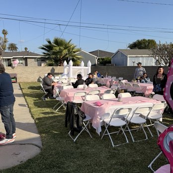 Rivera’s Rentals - 8 tables, 70 chairs, and 8 tablecloths (white) but we put pink plastic ones over so kids wouldn't ruin the white cloths - Party Equipment Rentals Near Me