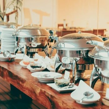 South Side Cafe - a long table full of food - Cafes Near Me - Rushville, Illinois