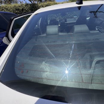 Blind Spot Tint & PPF - Rear window with residue that they refused to clean off. - Car Window Tinting Near Me - Irvine, California Blind Spot Tint & PPF - Rear window with residue that they refused to clean off. - Car Window Tinting Near Me - Irvine, California