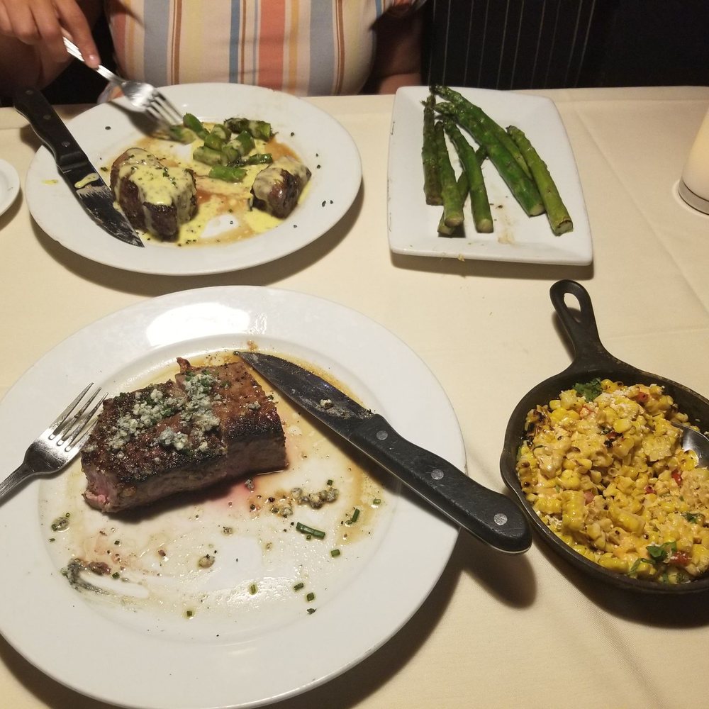 Roaring Fork - Half eaten NY Strip and Fillet - New American Near Me - Austin, Texas Roaring Fork - Half eaten NY Strip and Fillet - New American Near Me - Austin, Texas
