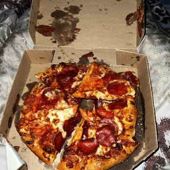 Domino's Pizza - a half eaten pizza in a box - Pizza Near Me - Austin, Texas Domino's Pizza - a half eaten pizza in a box - Pizza Near Me - Austin, Texas