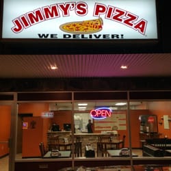Jimmy's Pizza - Sitting outside the store.
