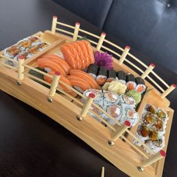 Salmon Lover sushi entree. Also on there is a sweet potato roll, eel avocado roll, and philadelphia roll. Salmon Lover sushi entree. Also on there is a sweet potato roll, eel avocado roll, and philadelphia roll.