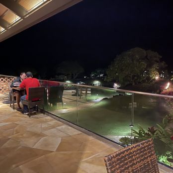 WIKIPIZZA - Seating overlooks the pool with Hanalei Bay in the background - Pizza Near Me - Princeville, Hawaii WIKIPIZZA - Seating overlooks the pool with Hanalei Bay in the background - Pizza Near Me - Princeville, Hawaii