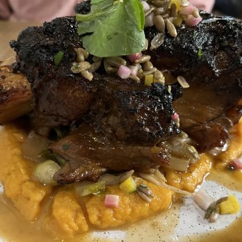 Restaurant Constance - Who knew placing a hunk of meat atop a bed of sweet potato would make cutting a bit difficult? - New American Near Me - Charlotte, North Carolina Restaurant Constance - Who knew placing a hunk of meat atop a bed of sweet potato would make cutting a bit difficult? - New American Near Me - Charlotte, North Carolina