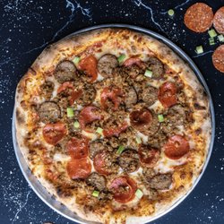Leighton's Pub - Three Meat Pizza at Lincoln's Pub