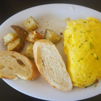 Monona Bakery & Eatery - The salmon omlette with potatoes (a few bites in) - Breakfast & Brunch Near Me - Madison, Wisconsin Monona Bakery & Eatery - The salmon omlette with potatoes (a few bites in) - Breakfast & Brunch Near Me - Madison, Wisconsin