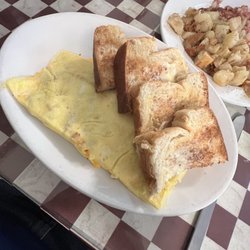 Brown Cow Restaurant - Ham and cheese omelette with the homemade hash.