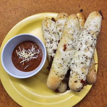 Pizza a'fetta - Cheesy breadsticks yum yum yum - Pizza Near Me - Cannon Beach, Oregon