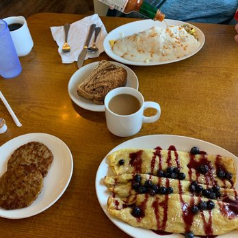 Flips Pancake House - Blue berry crepes with a side of sausage; and a Farmer's omelette with rye toast. - Breakfast & Brunch Near Me - Moline, Illinois
