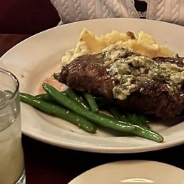Delmonico, medium-rare, mashed potatoes, sautéed green beans.