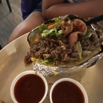 The Burger Barn - Brisket baked potato w/sauce on side - Burgers Near Me - Manvel, Texas