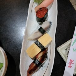 Fuji Grill - A la carte sushi @ Fuji Grill/Niagara Falls, NY: from top smoked salmon, salmon roe, makerel, omelette, eel.