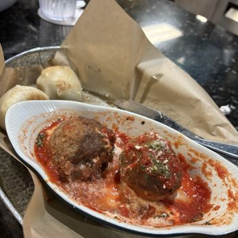 Vincenzo's Cucina - Bougie meatballs with ricotta partially eaten - Italian Near Me - Ponte Vedra Beach, Florida Vincenzo's Cucina - Bougie meatballs with ricotta partially eaten - Italian Near Me - Ponte Vedra Beach, Florida