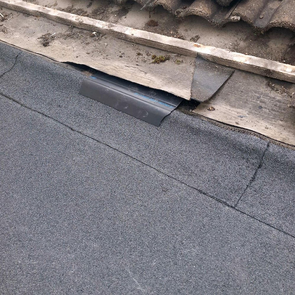 Slide of Pecan Park Roofing