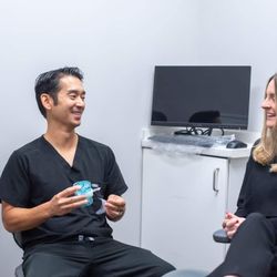 Texas Sleep & TMJ Solutions - Dr. Jason educating patient