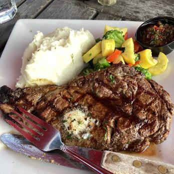 Leila by the Bay - Ribeye steak, mashed potatoes and steamed vegetables. - New American Near Me - Hercules, California Leila by the Bay - Ribeye steak, mashed potatoes and steamed vegetables. - New American Near Me - Hercules, California