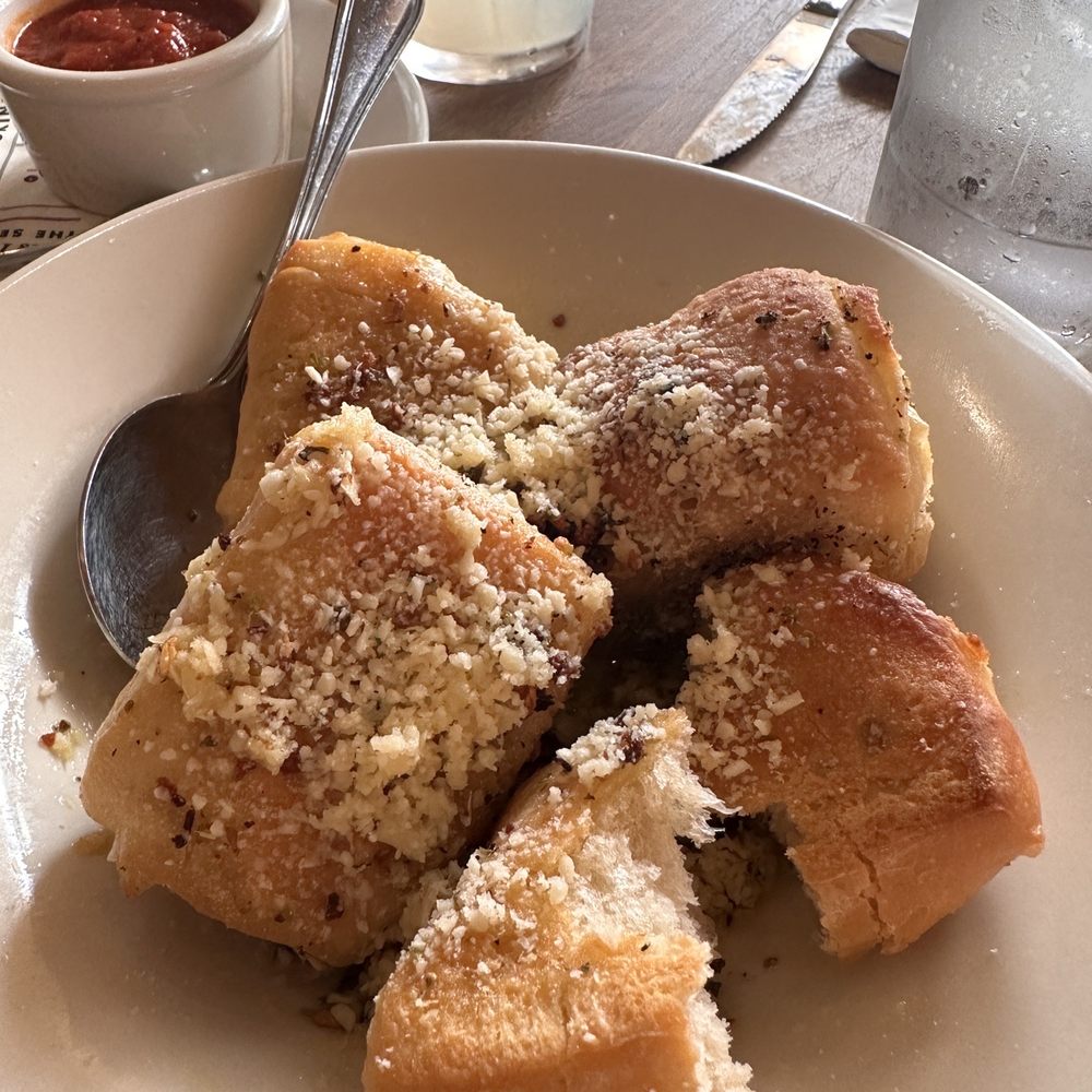 Tomatina - Tomatina's Signature Garlic Rolls - Italian Near Me - Alameda, California Tomatina - Tomatina's Signature Garlic Rolls - Italian Near Me - Alameda, California