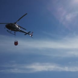 Small grass fire. Watching 'em drop water. Small grass fire. Watching 'em drop water.