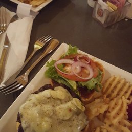 Mushroom Swiss burger and some fried crawfish tails. Mushroom Swiss burger and some fried crawfish tails.