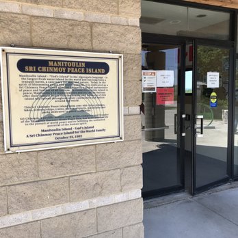 Manitoulin Tourist Information Centre - Entrance signage - Visitor Centers Near Me - Little Current, Ontario