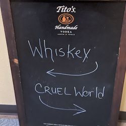 The Tavern - Funny sign near the door.