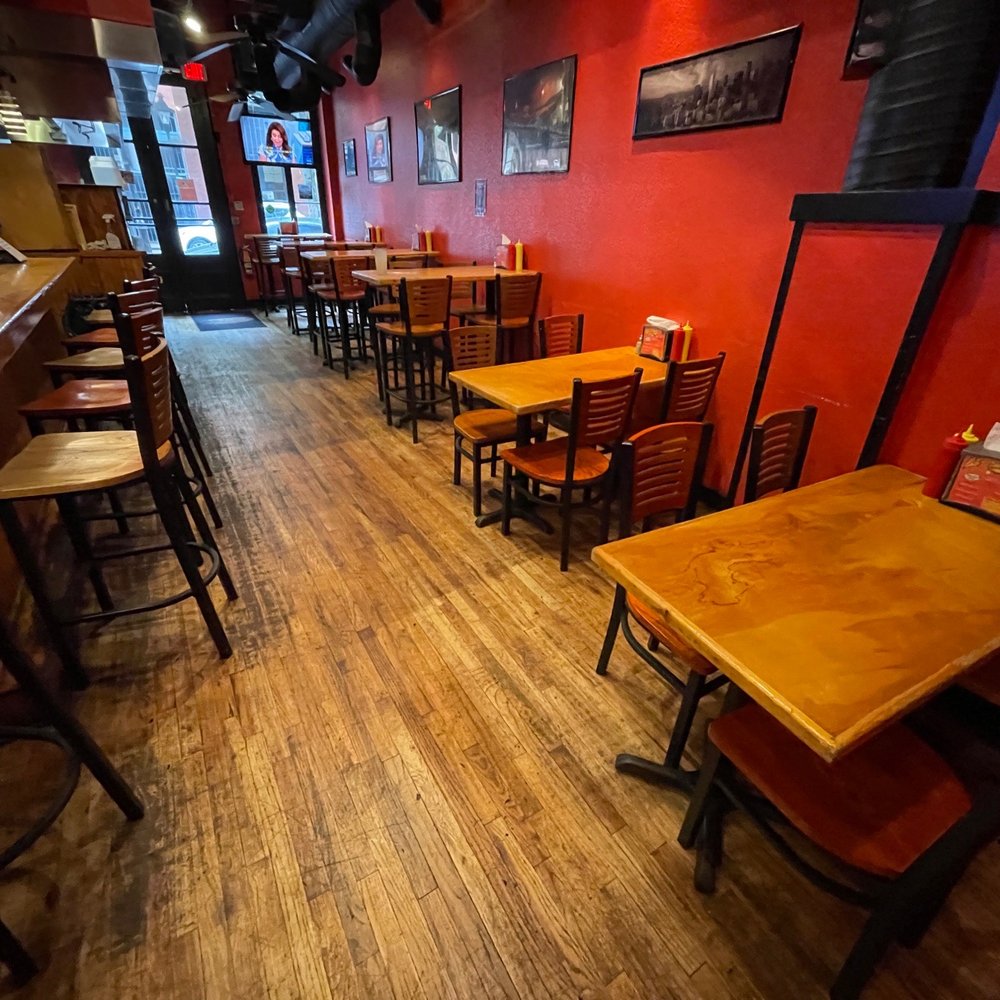 City Dogs - empty tables and chairs in a restaurant - Hot Dogs Near Me - Richmond, Virginia