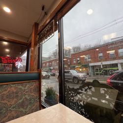 Harry's Famous Pizza - Booth seat with window view