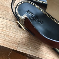 Jimmy Choo - Horrible quality.