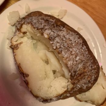 Texas Roadhouse - The film on the skin is heavily coated with course salt. Hard to see in the pic. - Steakhouses Near Me - Wausau, Wisconsin Texas Roadhouse - The film on the skin is heavily coated with course salt. Hard to see in the pic. - Steakhouses Near Me - Wausau, Wisconsin