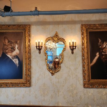 Chat-Colate - two portraits of cats on a wall - Ice Cream & Frozen Yogurt Near Me - Montreal, Quebec Chat-Colate - two portraits of cats on a wall - Ice Cream & Frozen Yogurt Near Me - Montreal, Quebec