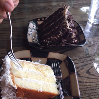 Rainer's - Coconut cake and chocolate cake with hazelnut cream. - Bars Near Me - Greenville, South Carolina