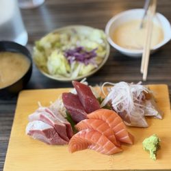Sushi Tomi - Lunch sashimi with 4 types of sashimi, salad , soup and rice .