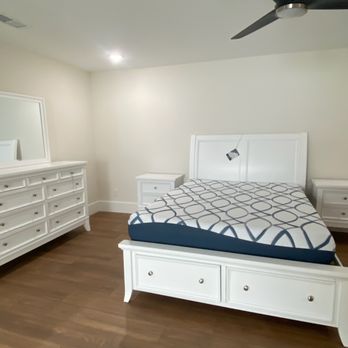Ashley Store - bed in room with dresser and mirror - Furniture Stores Near Me - Myrtle Beach, South Carolina