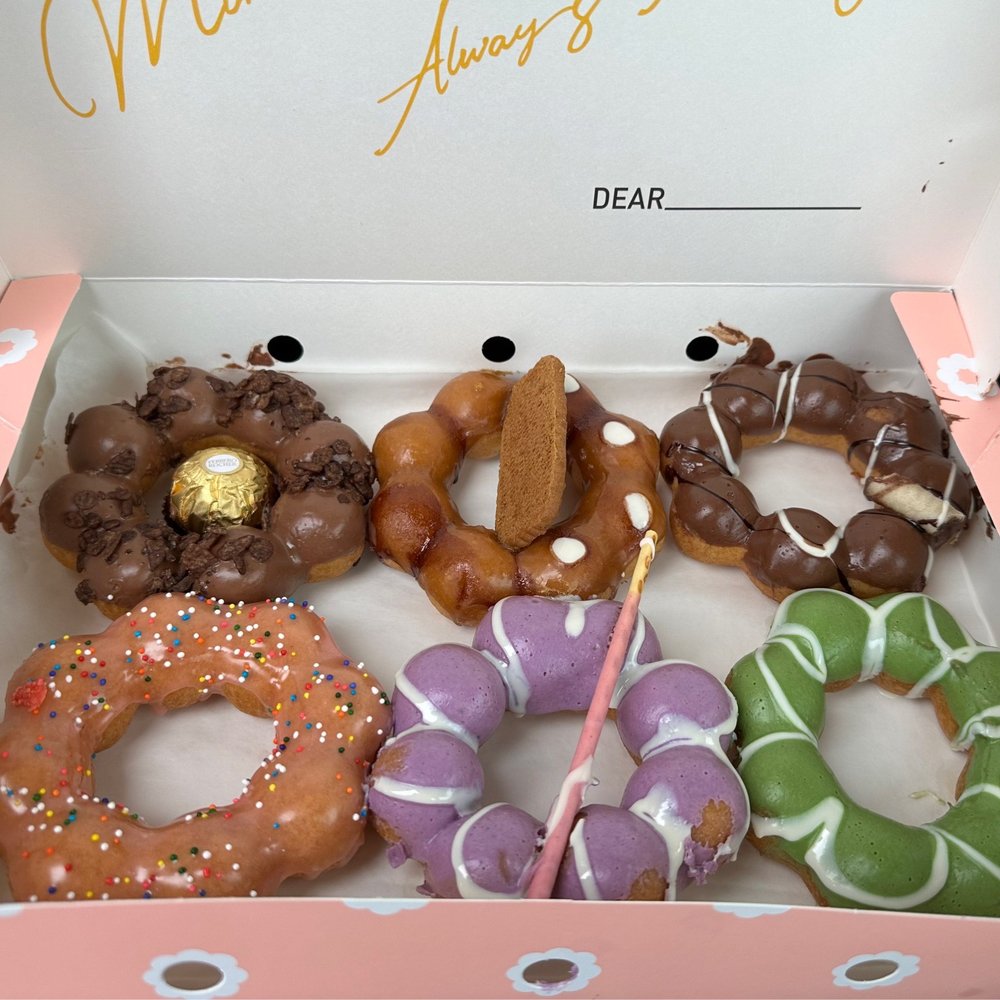 Mochinut - Rochester - Dark chocolate, Vietnamese coffee, nutella, Guava, ube, matcha. - Desserts Near Me - Rochester, New York Mochinut - Rochester - Dark chocolate, Vietnamese coffee, nutella, Guava, ube, matcha. - Desserts Near Me - Rochester, New York