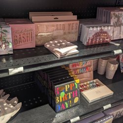 If It's Paper - Shelves adorned with fun party decor