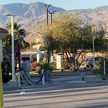 McDonald's - a gas station with mountains in the background - Burgers Near Me - Palm Desert, California McDonald's - a gas station with mountains in the background - Burgers Near Me - Palm Desert, California