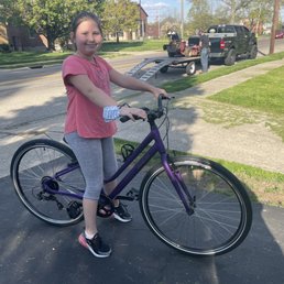 My daughter with her new bike.