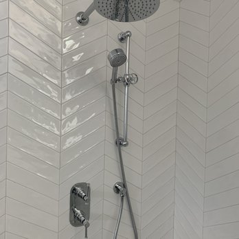 Tile Masters - a shower with a shower head - Flooring Near Me - san jose, California
