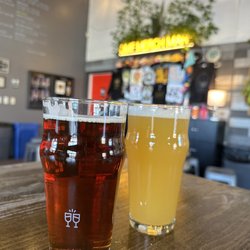 Our Mutual Friend Brewing Company - Dome flow (amber ale) in front and Baryon Sweep (juicy IPA) in the back