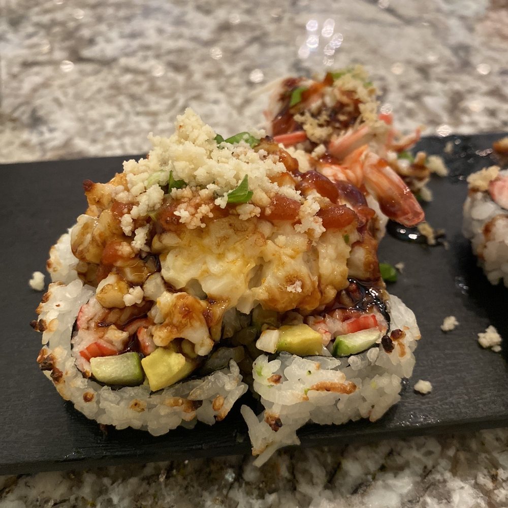 Oceano - Half on an eruption roll because it was so delicious I forgot to take a photo before eating - Seafood Near Me - Reno, Nevada