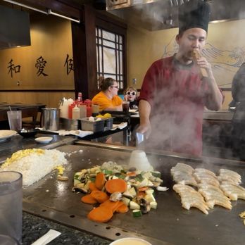 Tonbo - Our cook showing us the volcano with whistle - Sushi Bars Near Me - Port Richey, Florida