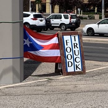 Jireh Kitchen - a sign on the side of a building - Puerto Rican Near Me - Albuquerque, New Mexico