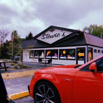 Stewie's - a red sports car parked in front of a restaurant - American Near Me - Matamoras, Pennsylvania Stewie's - a red sports car parked in front of a restaurant - American Near Me - Matamoras, Pennsylvania