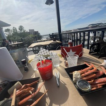 Blu Crabhouse & Raw Bar - Snow crab legs, malibu rum bucket - Seafood Near Me - Ocean City, Maryland