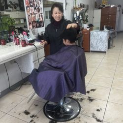 Nees Salon - Matteo getting his hair cut by the owner. She is very nice and sweet.