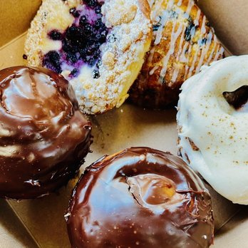 May's Parlor - Top clockwise: blueberry scone; cinnamon roll with cream cheese frosting; chocolate ganache cruffins; blueberry danish - Bakeries Near Me - Norfolk, Virginia