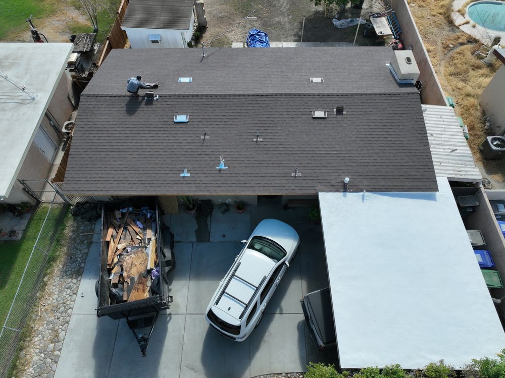 Slide of First Division Roofing