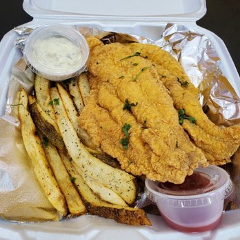 Sip City Daiquiris - fried fish and fries in a styrofoam container - Cocktail Bars Near Me - Houston, Texas